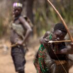 Hadzabe target shooting practice before hunting